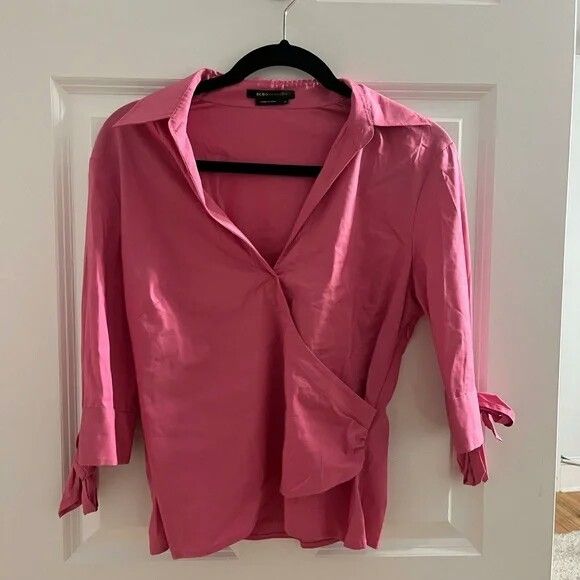 BCBG- Hot pink low cut collared shirt (Category: Blouses) located in Iloilo. Submitted by sabby2016 (Listing ID 1255725587, Image 1). Description: BCBG- Hot pink low cut collared shirt BCBGMaxAzria good condition no other thread issues size:small on tag addship.