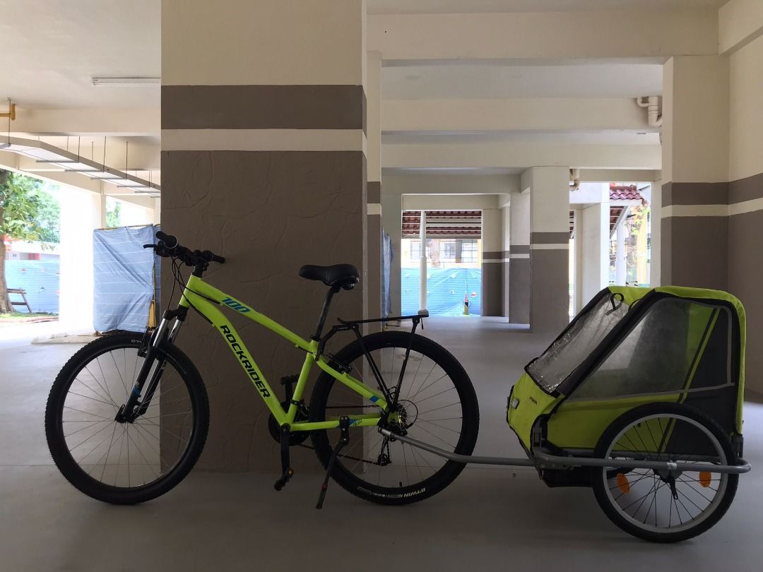 FREE BTWIN 2 SEATER TRAILER FROM DECATHLON. COMES WITH ALMOST NEW ROCKRIDER MOUNTAIN BIKE