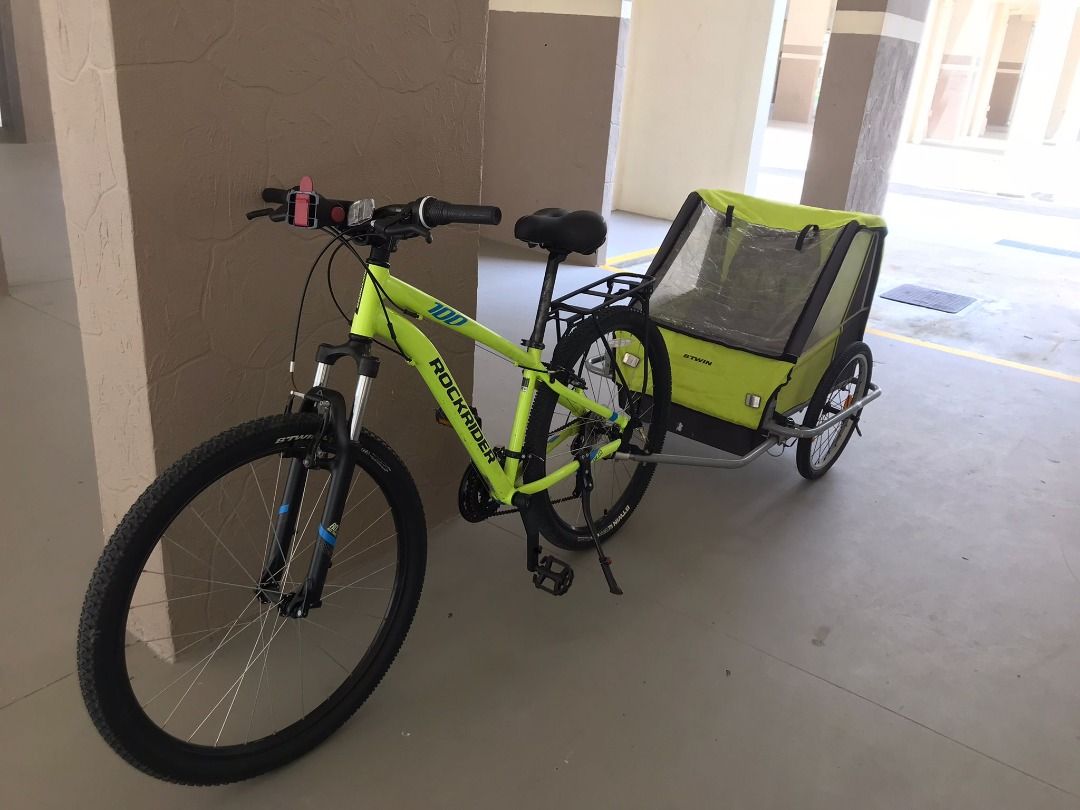 FREE BTWIN 2 SEATER TRAILER FROM DECATHLON. COMES WITH ALMOST NEW ROCKRIDER MOUNTAIN BIKE
