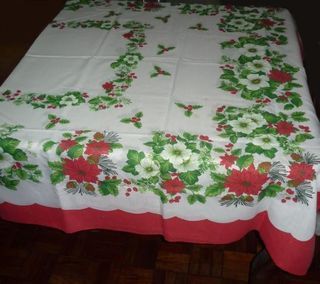 Christmas holiday tablecloth and table napkins with holly and poinsettia design