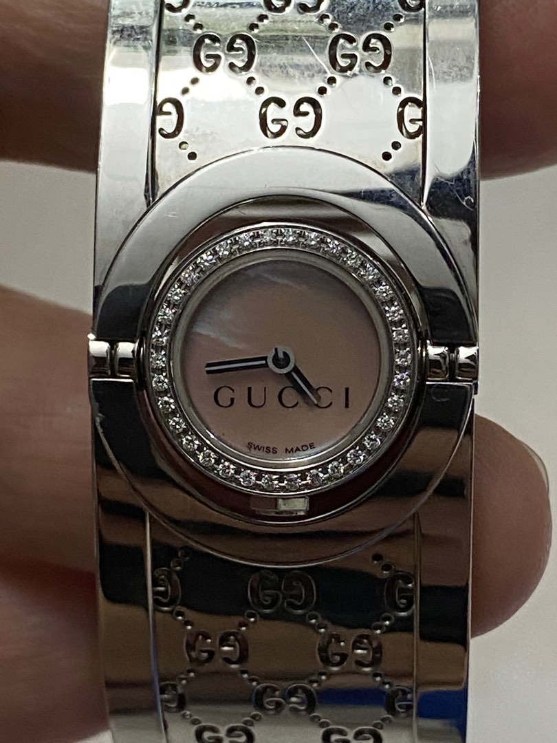 Gucci twirl top watch fake