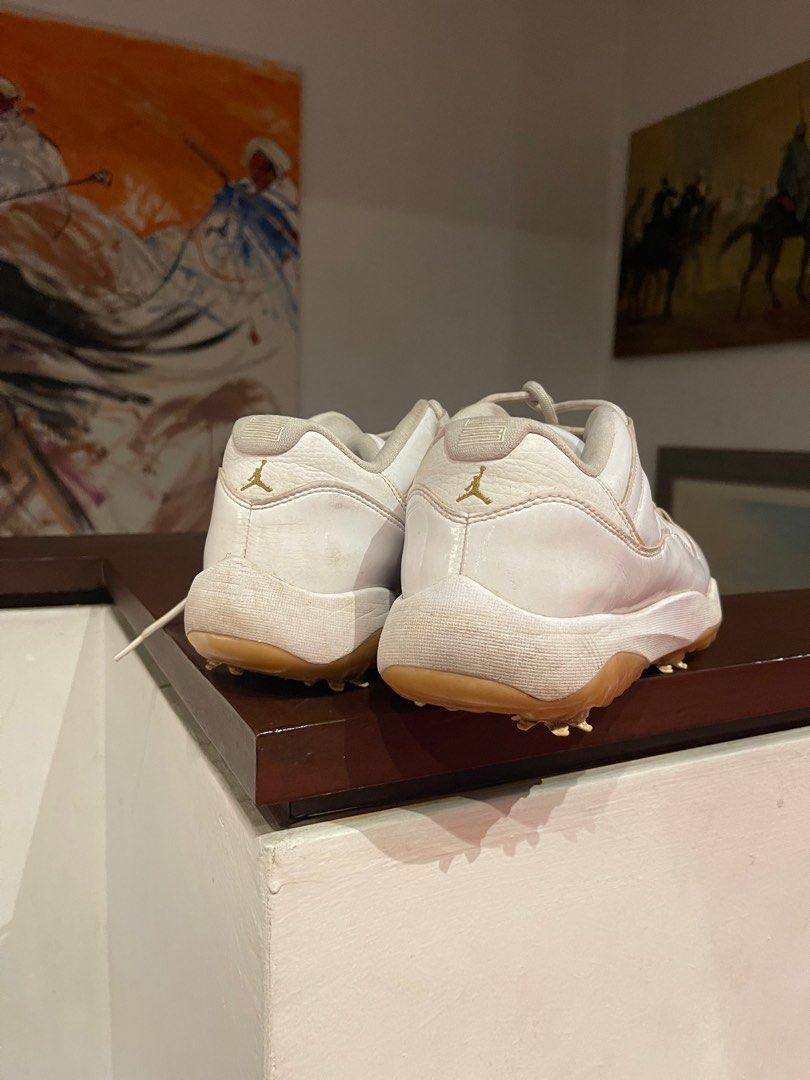 Jordan 11 retro low sale golf white metallic gold