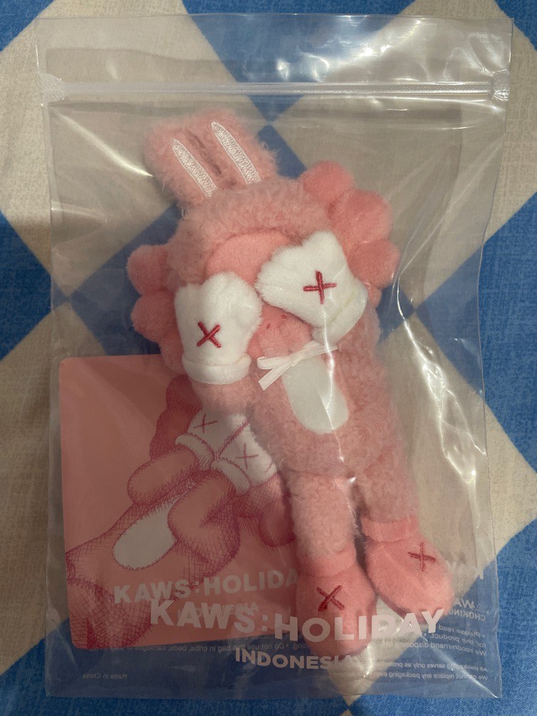 KAWS Holiday Indonesia Plush Charm pink-