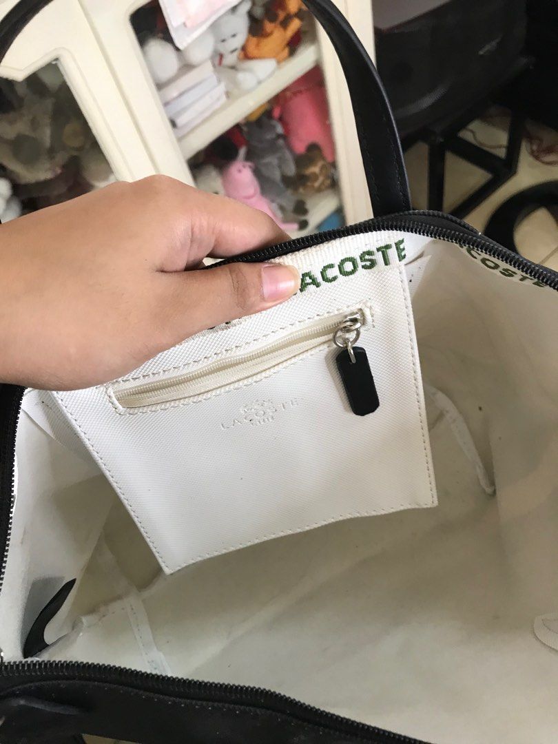 Pochette hotsell lacoste mickey