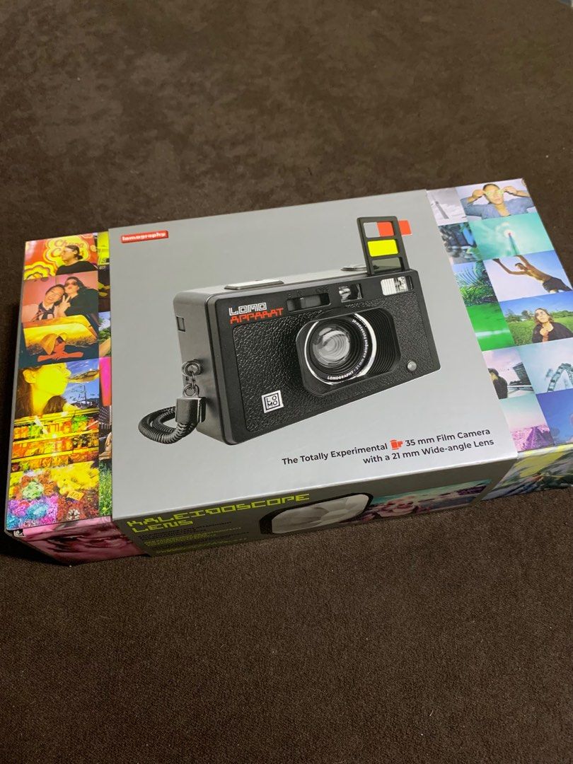 Lomo Apparat #Lomography (Category: Cameras) located in Manila. Submitted by coolstuffonlyyy (Listing ID 1255751385, Image 2). Description: w/ free unopened Agfa photo black & white film 400 ISO (36 shots) -No issues; barely used Film Format: 35 mm Focal Length: 21 mm Available Apertures: f10 Shutter Speed: 1/100 (N), Bulb (B) Flash: Built In Flash Available ISO Settings: No ISO Adjustment Multiple Exposure: Yes Tripod Mount: Yes Cable Release: N