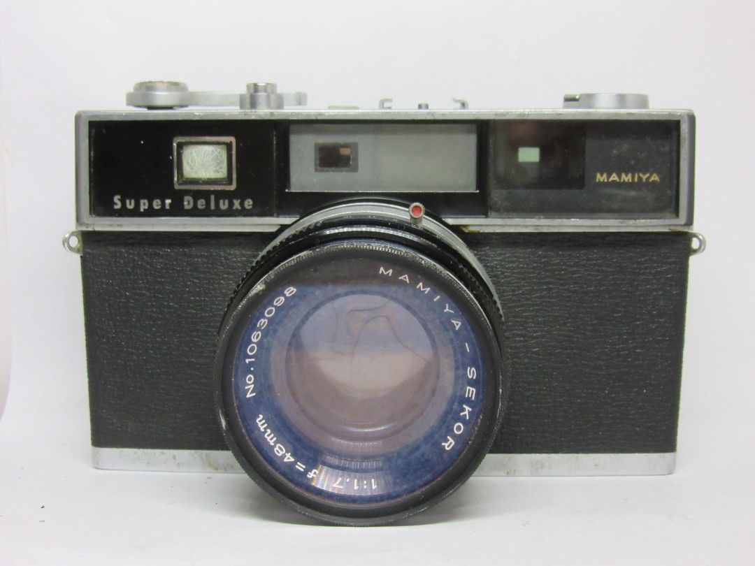 Mamiya Super deluxe 1960s (Category: Cameras) located in Las Pinas. Submitted by film101 (Listing ID 1255639280, Image 2). Description: 🌿Mamiya SUPER DELUXE 🌼35mm film camera 🌼Newly clean finder‼️ 🌼Newly clean optics‼️ -it's a mechanical rangefinder -with 48mmf1.7 lensmamiya 🌹CONDITION of camera😽 🔸Shutter working 🔸All mechanical speed workin 🔸Aperture snaps workin 🔸Advance lever good 🔸Optics very nice, clean! 🔸Parralax working, contra