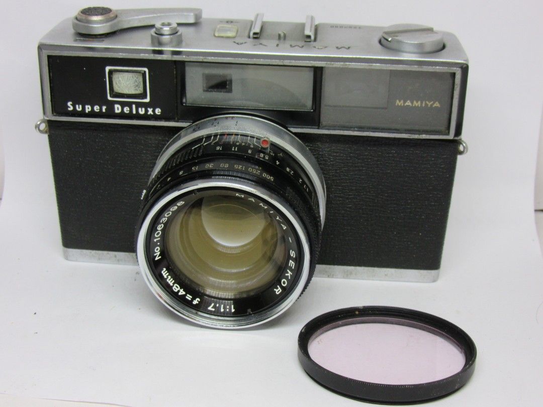 Mamiya Super deluxe 1960s (Category: Cameras) located in Las Pinas. Submitted by film101 (Listing ID 1255639280, Image 1). Description: 🌿Mamiya SUPER DELUXE 🌼35mm film camera 🌼Newly clean finder‼️ 🌼Newly clean optics‼️ -it's a mechanical rangefinder -with 48mmf1.7 lensmamiya 🌹CONDITION of camera😽 🔸Shutter working 🔸All mechanical speed workin 🔸Aperture snaps workin 🔸Advance lever good 🔸Optics very nice, clean! 🔸Parralax working, contra