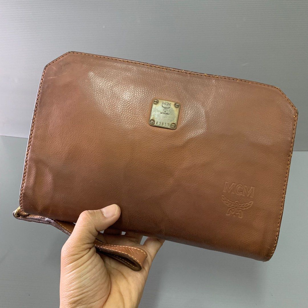 MCM Clutch Bag, Luxury, Bags & Wallets on Carousell