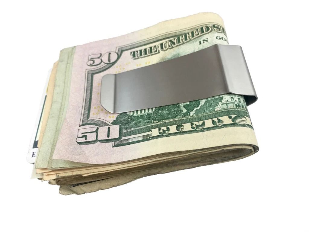 Titanium Money Clip REV 2 ~ by Maratac (Category: Wallets & Card Holders) located in San Juan City. Submitted by cvudy (Listing ID 1255657338, Image 1). Description: Titanium Money Clip REV 2 ~ Newest Rev Model The CountyComm Titanium Money Clip 2.0 has been custom manufactured in-house after thousands of requests and years of waiting. The new and improved design has several adjustments over the first model. The slightly taller clip size will acc