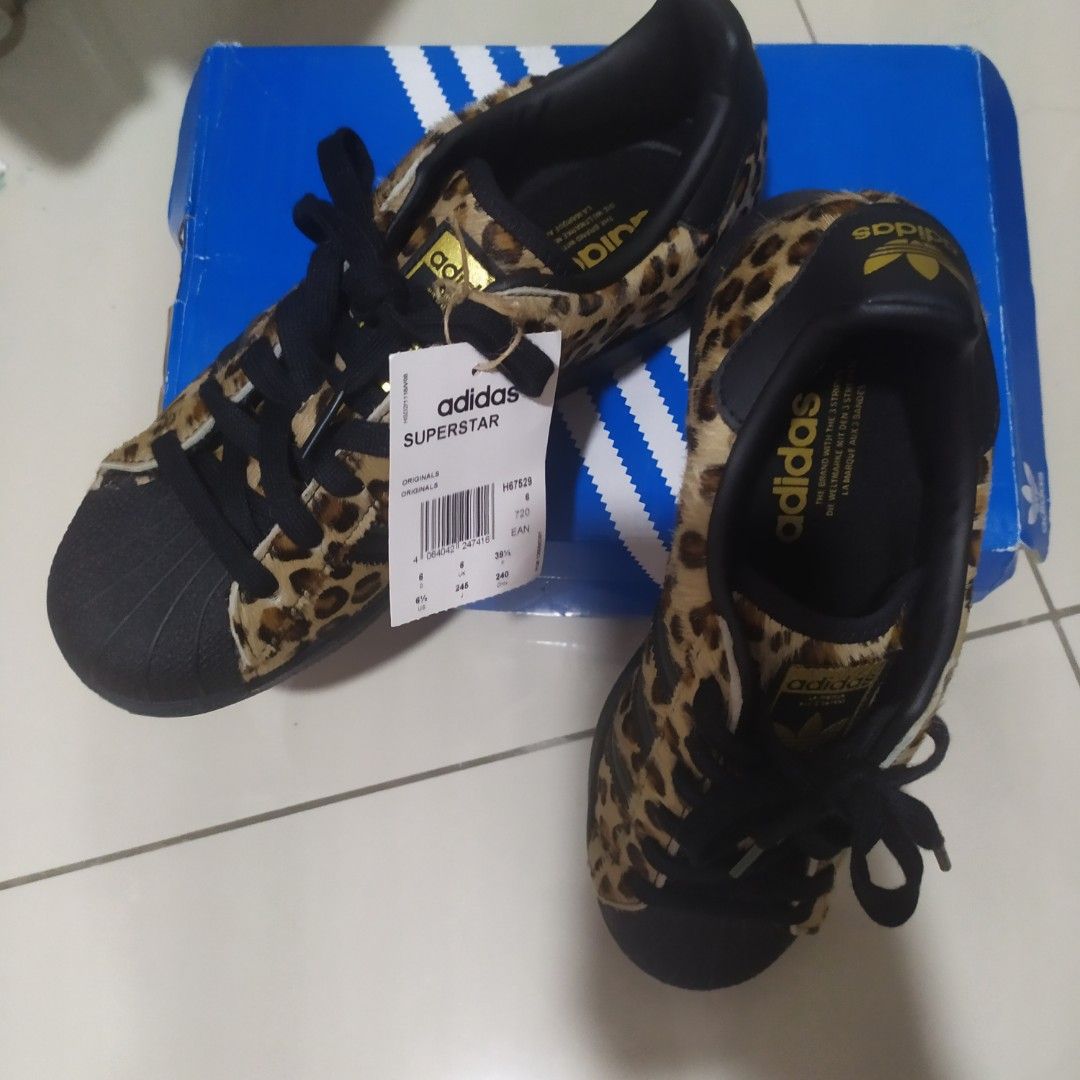 Leopard adidas superstar store