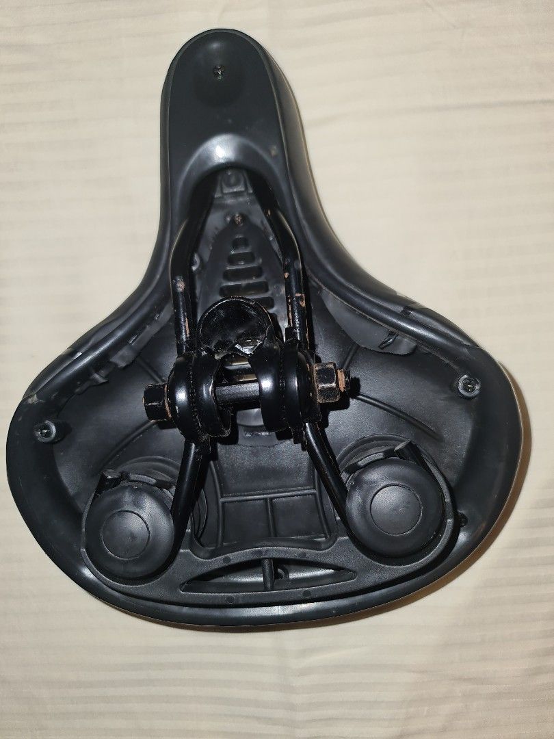 Bicycle seat (Category: Bicycles) located in Makati City. Submitted by harvesting_game (Listing ID 1252501060, Image 3). Description: Replacement bicycle seat for mountain bike, e-bike, etc. -Ergonomic -Memory Foam comfort seat - has red Safety lens strip for better visibility -dual spring and hollow breathable design - Universal bike seat rail clamp -waterproof -20cm W 25cm L perfect replacement seat..great for longer and more comfortable rides!