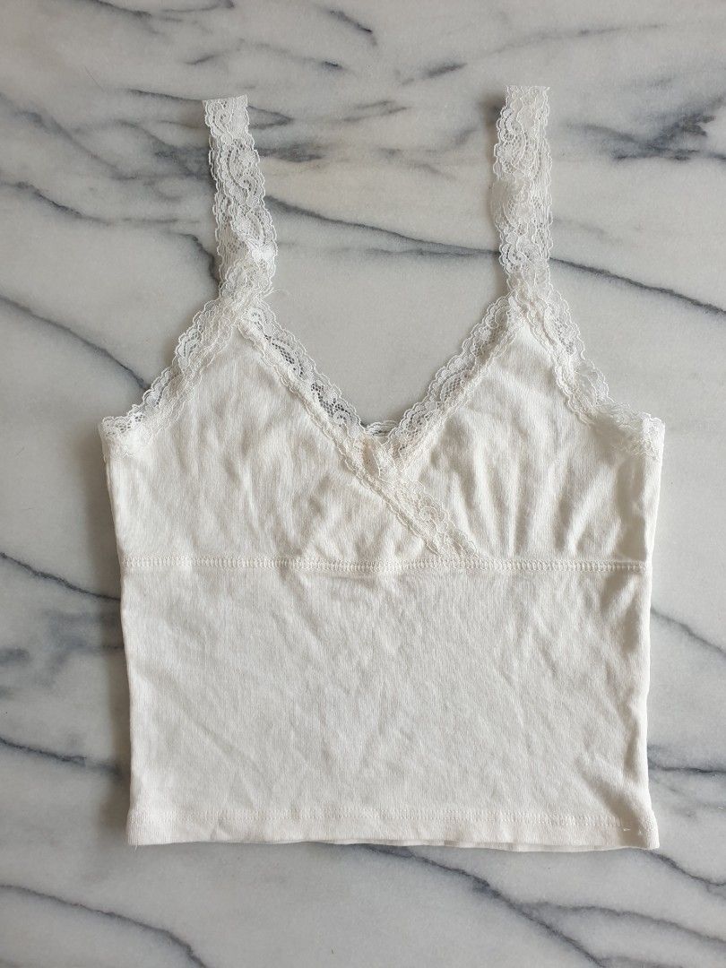 Brandy Melville white lace Eleanor tank top, Women's Fashion, Tops,  Sleeveless on Carousell
