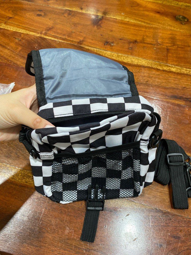 Checkered side bag outlet