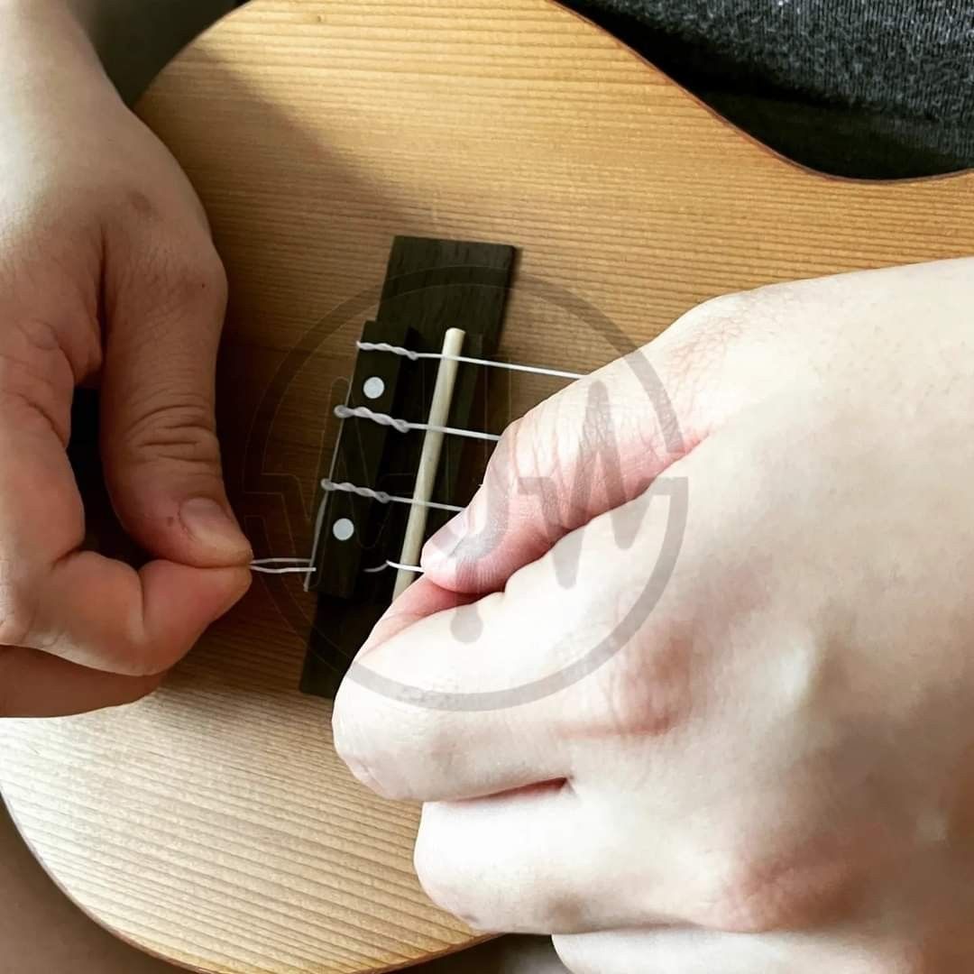 Ukulele restringing cheap near me