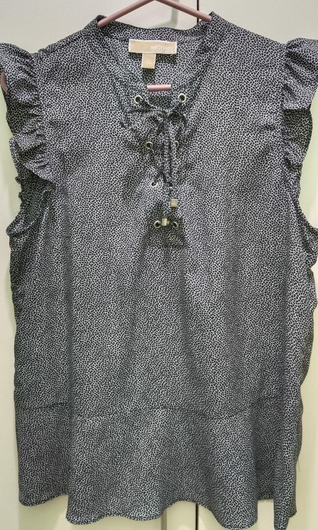 Michael Kors blouse (Category: Blouses) located in Quezon City. Submitted by iganda (Listing ID 1252545619, Image 1). Description: Brand new MK blouse polyester large.