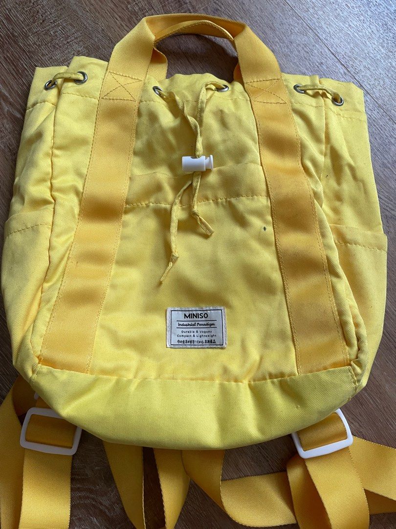 Miniso yellow drawstring backpack Women s Fashion Bags Wallets Backpacks on Carousell
