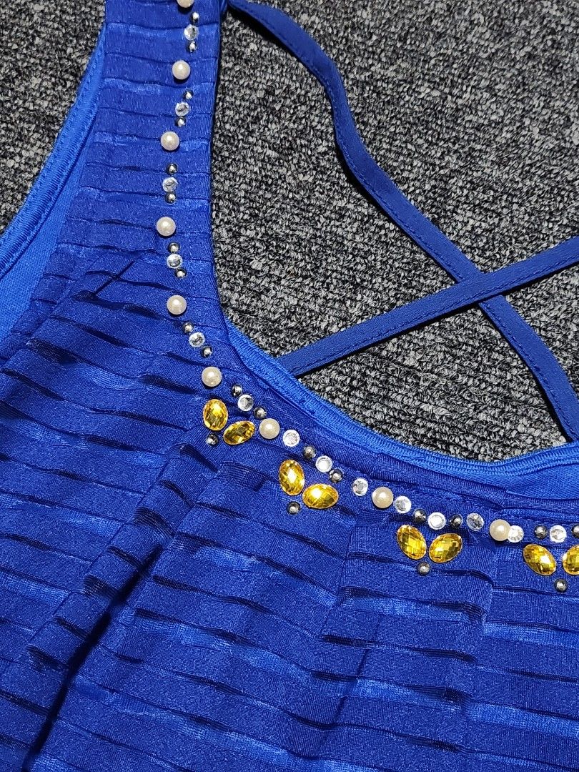 One way Cross Back design Sleeveless top (Category: Sleeveless) located in Tarlac. Submitted by jemserrano (Listing ID 1252508302, Image 3). Description: One way Brand Cross Back design with gems neck lining Royal Blue color 10/10 color rate Medium.