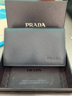 Prada Saffiano Leather wallet with shoulder strap, Luxury, Bags & Wallets  on Carousell