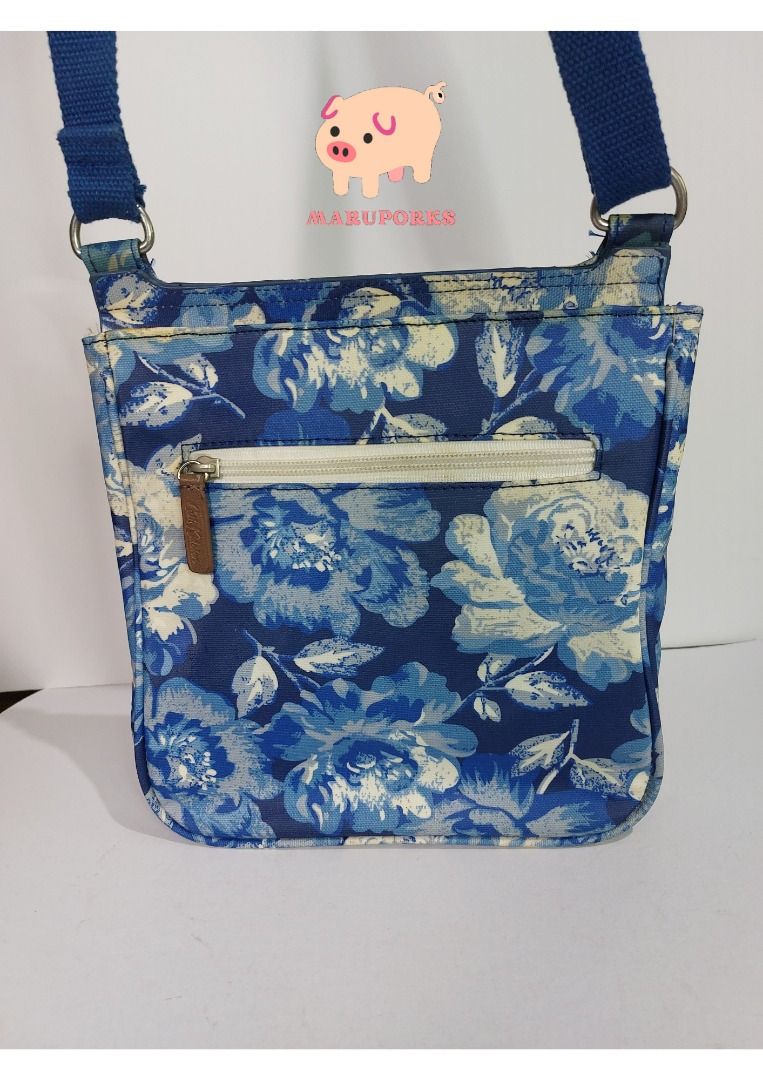 Preloved Bag | Cath Kidston | Blue Vertical Sling Bag (Category: Purses & Pouches) located in Mandaluyong City. Submitted by maruporks (Listing ID 1252576977, Image 3). Description: Mode of Payment: Gcash / Komo / Shoppee Pay Transfer Mode of Delivery: Grab and Lalamove (Only in the morning), or via J&T (Drops off during weekend) Brand: Cath Kidston Color: Blue and White Combination Print Design: Floral Style: Vertical Sling Bag Material: PVC Lea