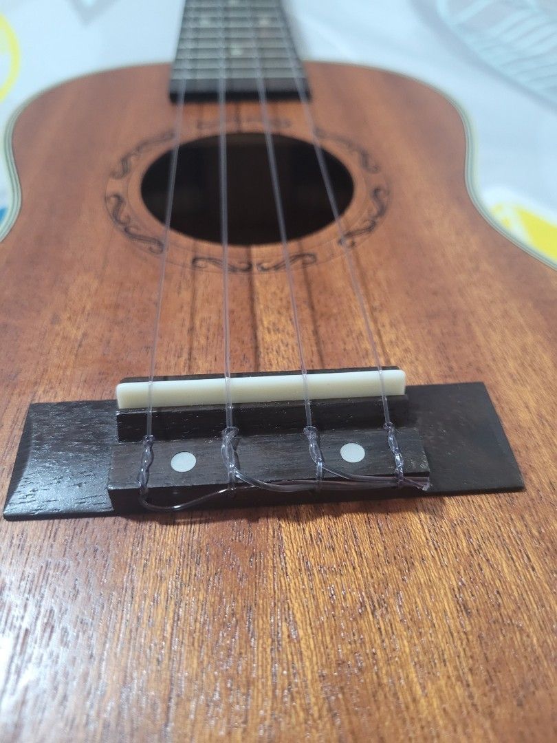 Ukulele restringing sales near me