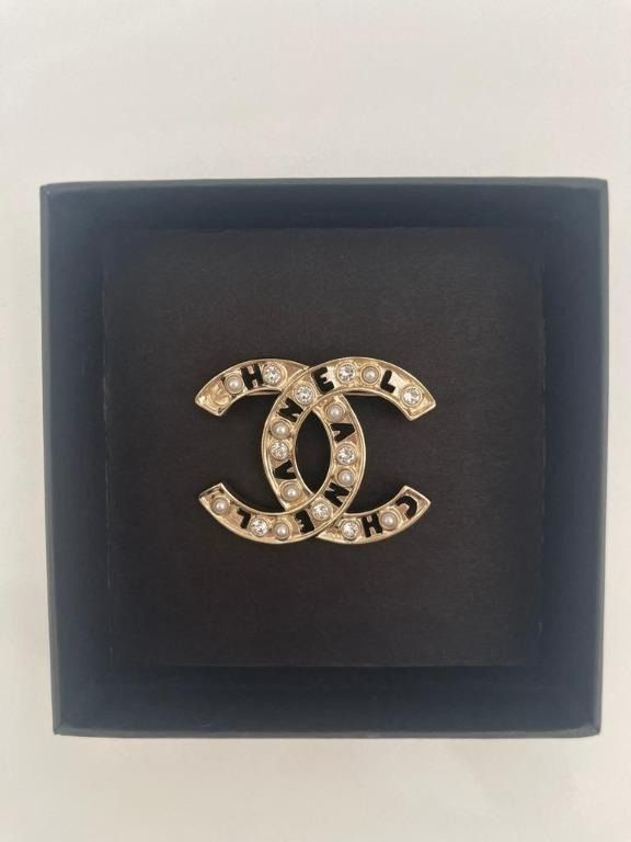 Brand new Chanel Brooch 100 authentic with receipt original
