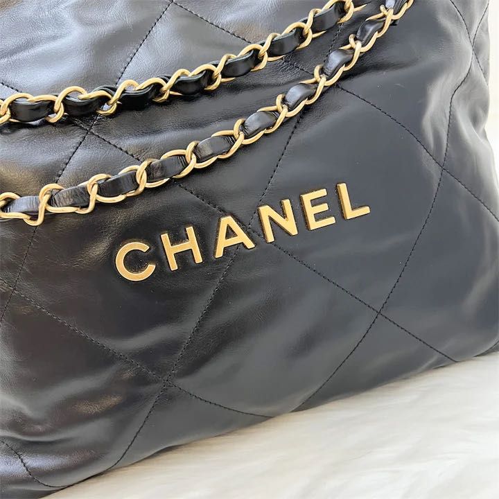 Chanel 22 mini hobo bag gold-tan calfskin