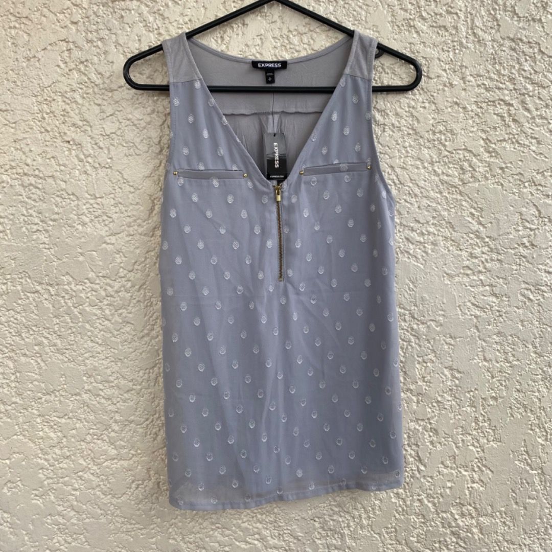 Express Gray Sleeveless Top Blouse Shirt (Category: Sleeveless) located in Cainta. Submitted by paintsoil (Listing ID 1255823460, Image 1). Description: Express Gray Sleeveless Top Blouse Shirt - Brand new with tag - Authentic Express Blouse - Size: Small on tag - Price: ₱400.