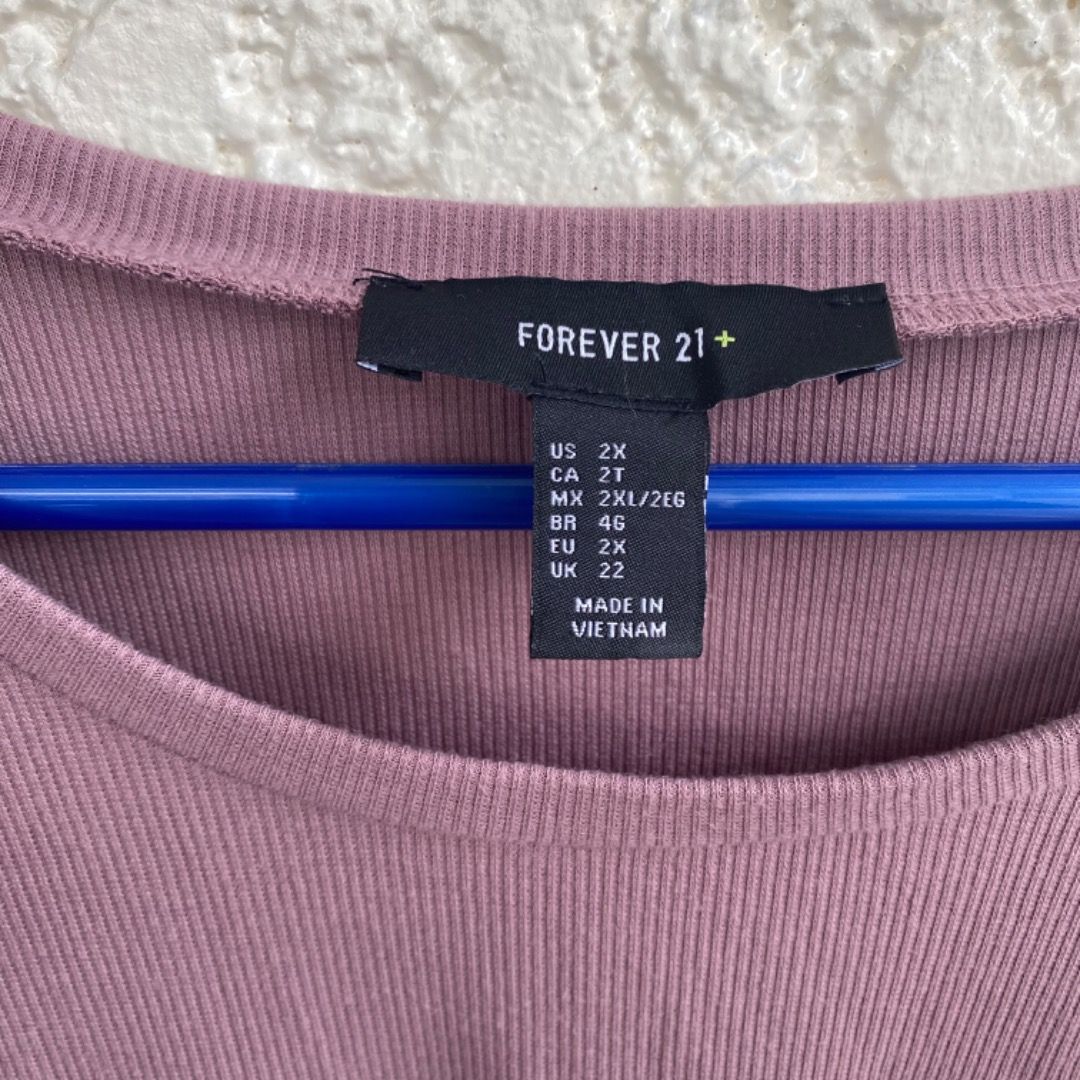 Forever 21 Purple Ruffled Longsleeve Shirt (Category: Longsleeves) located in Cainta. Submitted by paintsoil (Listing ID 1255815331, Image 3). Description: Forever 21 Purple Ruffled Longsleeve Shirt - Used but still in a great condition - Size: Medium on tag - Price: ₱200.