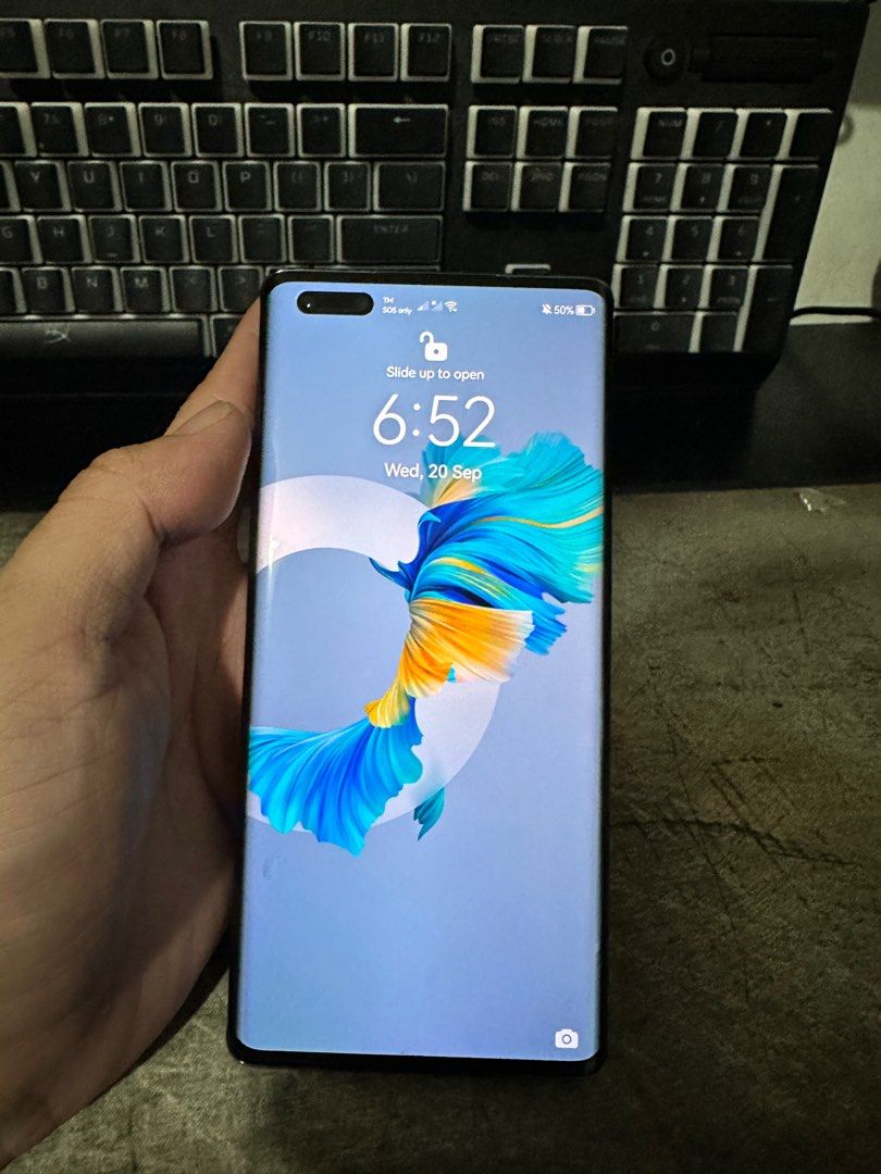 Huawei mate 40 pro (Category: Huawei) located in Caloocan City. Submitted by blackfire_07 (Listing ID 1255873025, Image 3). Description: Selling huawei mate 40 pro Used like new walang dents or scratches check nyo nalang upon meetup Complete with charger and accesories (not used) Negotiable Pwede din swap sa samsung note 20 ultra, samsung s21 ultra or s22 ultra add cash ako Rfs di masyadong gamay ang huawei.