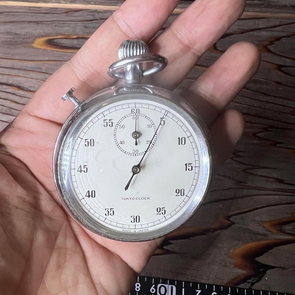 Japan Surplus Tokyo Clock Stopwatch with visible scratches and rust on