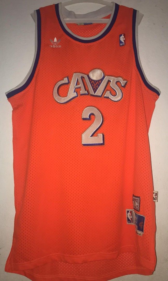 Orange kyrie sale irving jersey