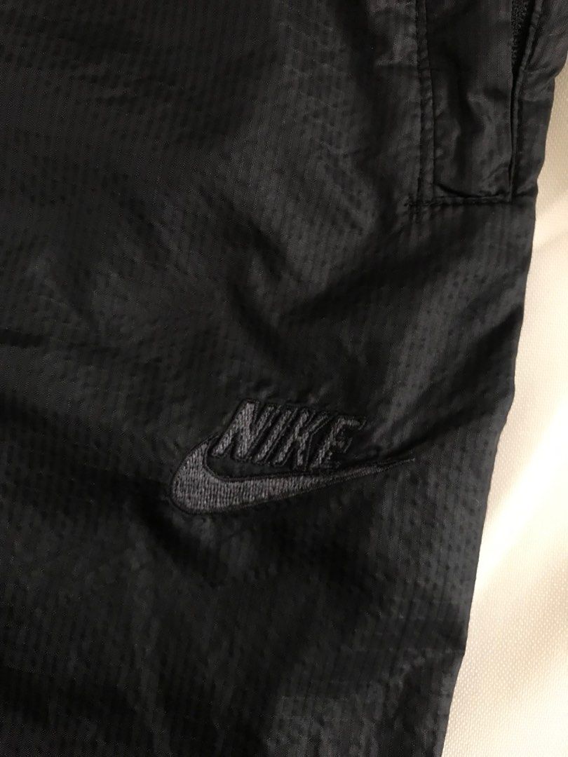 black and gold nike pants
