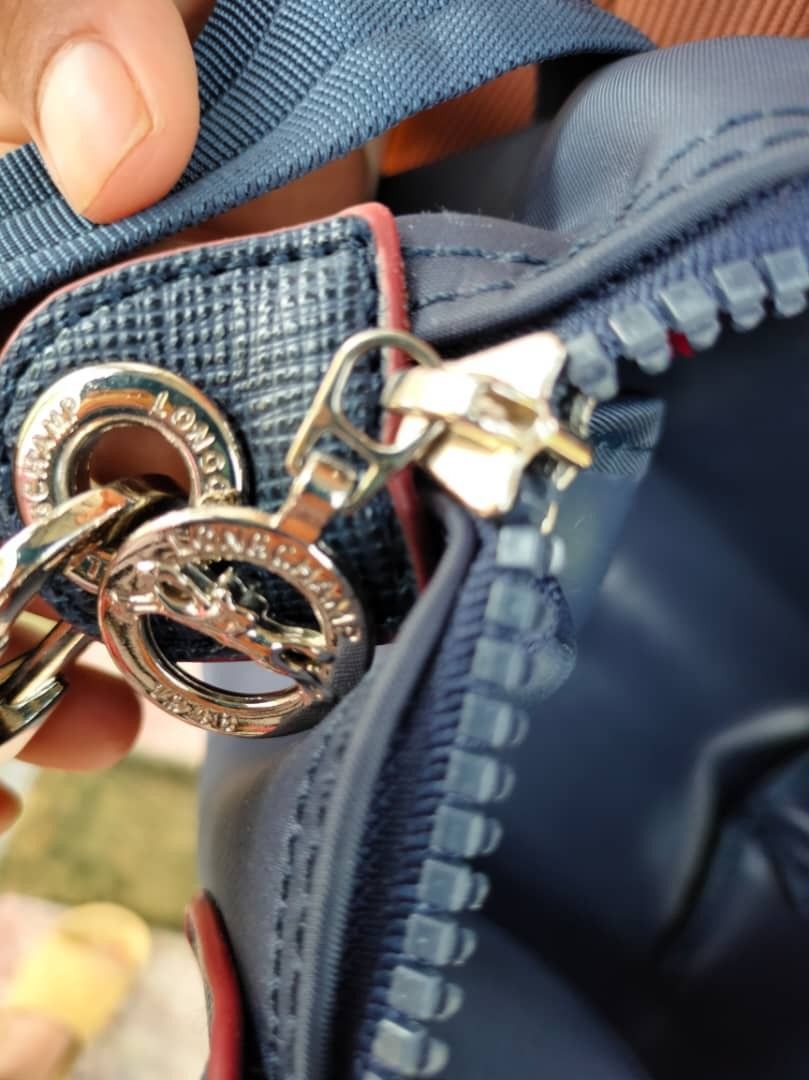 Original Longchamp zip YKK, Luxury, Bags & Wallets on Carousell