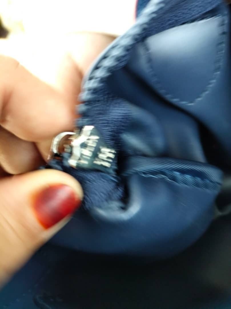 Original Longchamp zip YKK, Luxury, Bags & Wallets on Carousell