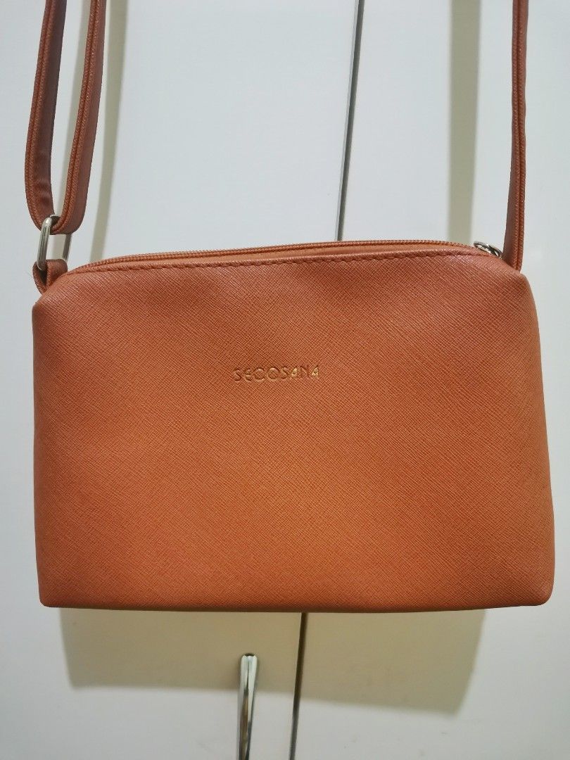 Secosana Sling Bag (Category: Cross-body Bags) located in Davao. Submitted by allthatstuff (Listing ID 1255900132, Image 2). Description: Dimensions: 24cm x 5cm x 18cm Used only a few times Still in very good condition RFS: Decluttering Payment plus SF if delivery.