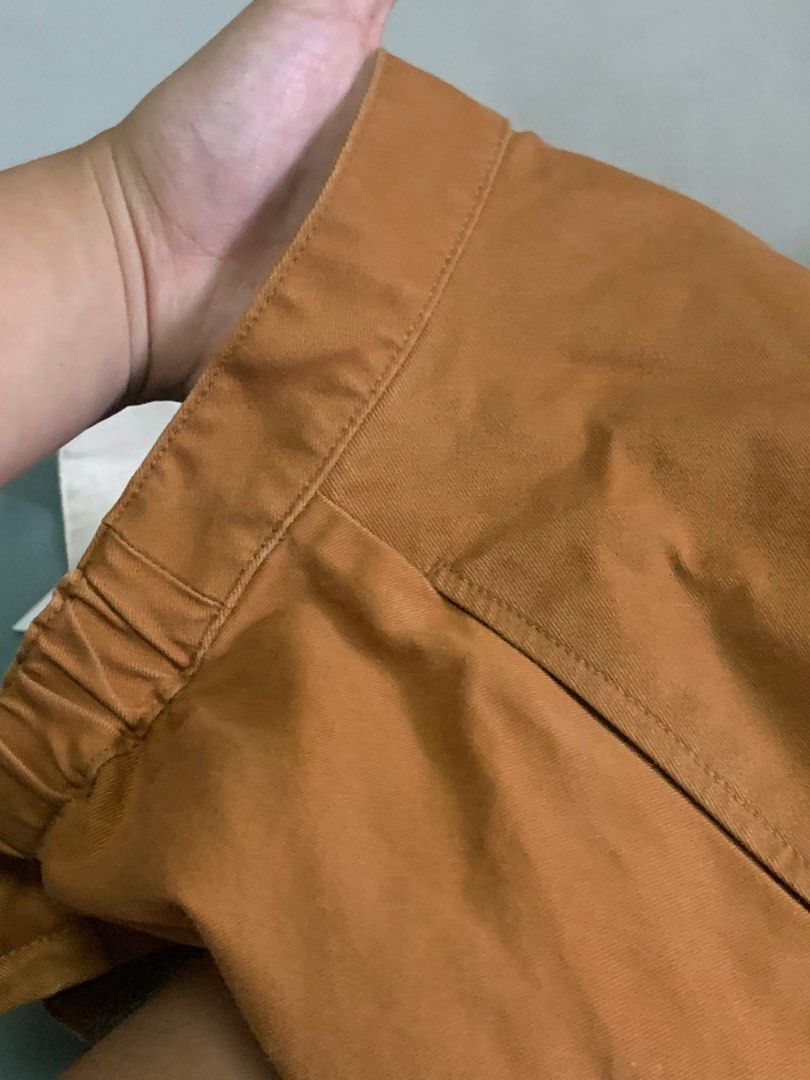 Uniqlo Rust Skirt (Category: Skirts) located in Quezon City. Submitted by secondhandsiz (Listing ID 1255812536, Image 3). Description: Thrifted HQ Uniqlo skirt. Stiff/sturdy material (denim-like).