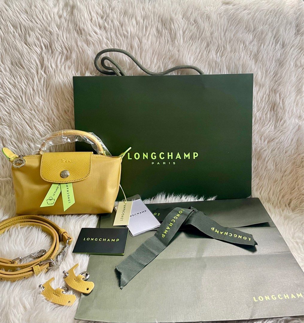 longchamp mini pouch with sling, Luxury, Bags & Wallets on Carousell