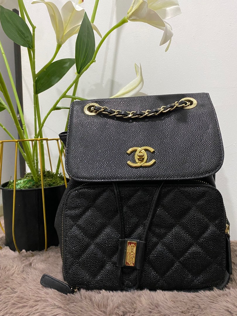 Chanel outlet backpack fake