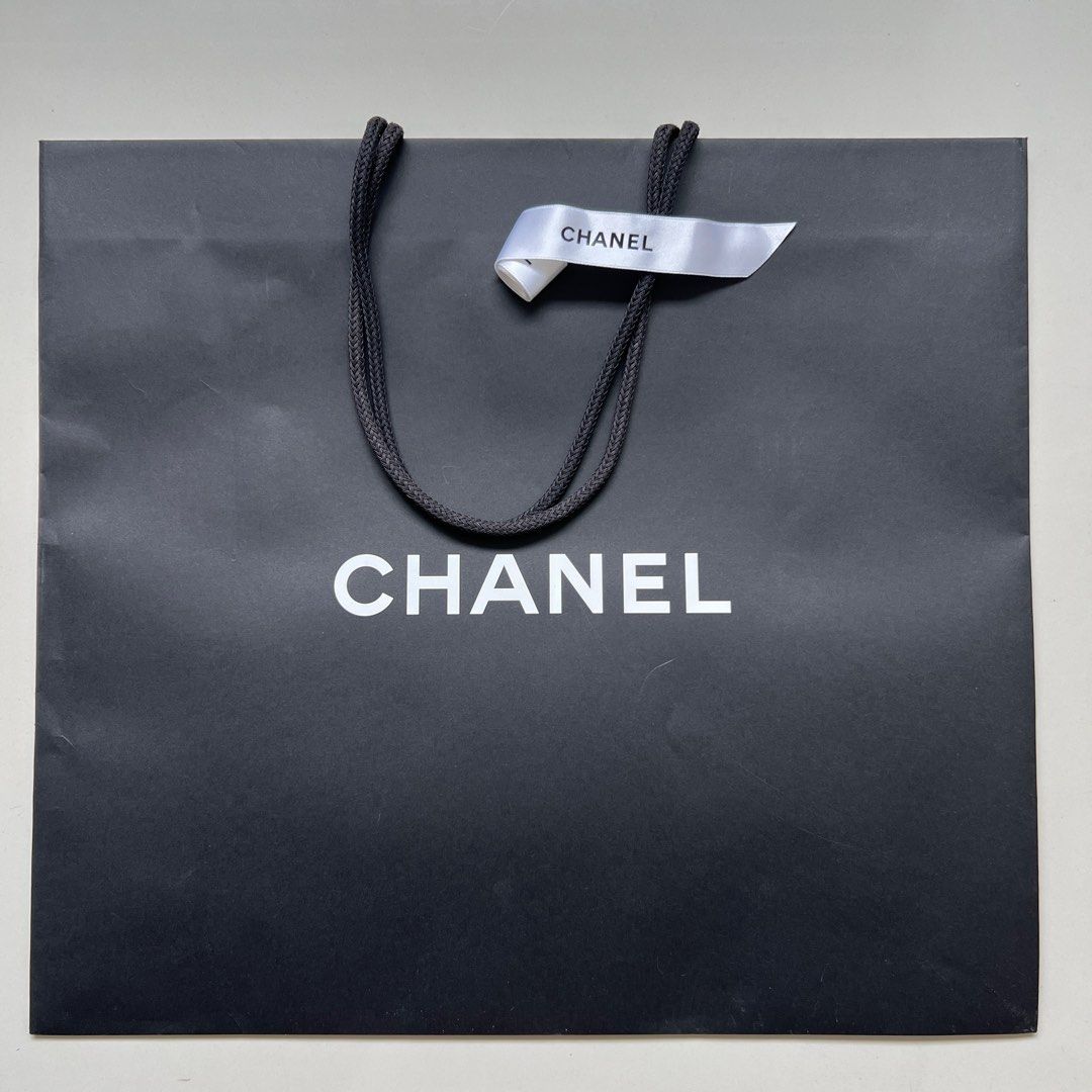 Chanel paper bag, Luxury, Bags & Wallets on Carousell