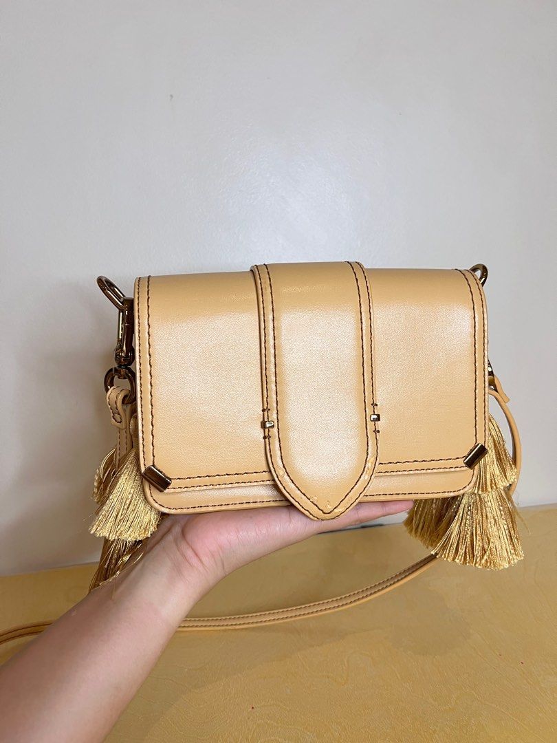 Charles and keith best sale tassel shoulder bag