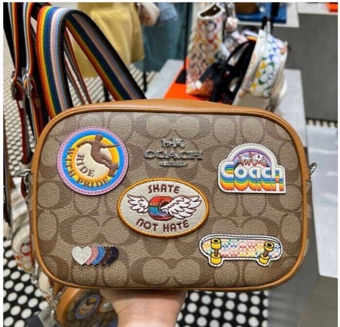 Coach camera sling best sale bag