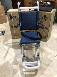 Compact travel wheel chair