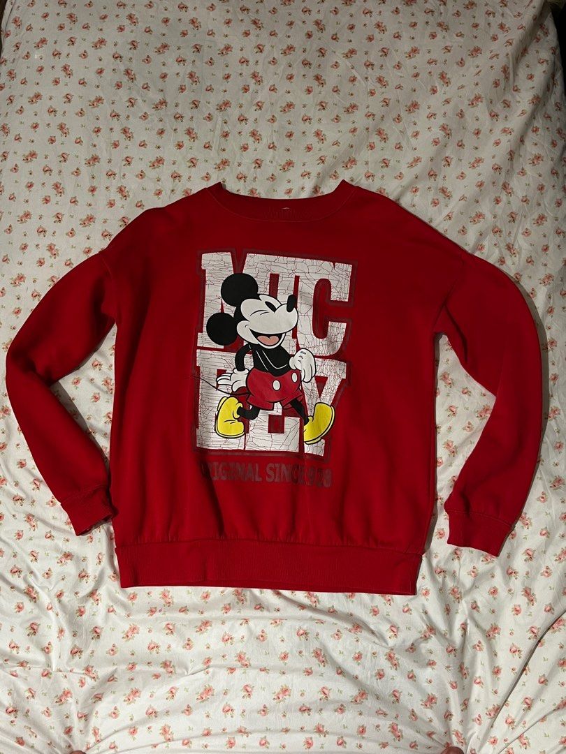 Girl in red top sweatshirt