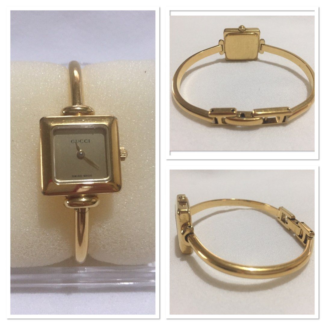 Gucci Watch (Category: Women's Watches) located in Lubao. Submitted by vidap (Listing ID 1256110441, Image 2). Description: Gucci Watch / Preloved Size: 16.5 cm This is a stunning Gucci square-face bangle watch — a timeless, minimalist design in polished gold-tone with a signature square dial, engraved Gucci logo, and "Swiss Made" marking. The sleek bangle band makes it elegant and versatile..