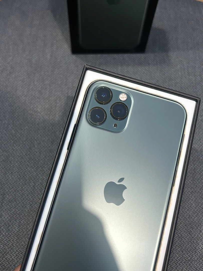 iPhone 11 Pro MIDNIGHT GREEN (Category: iPhone 11 Series) located in Cavite. Submitted by neilgadgets (Listing ID 1256105661, Image 2). Description: FOR SALE or SWAP iPhone 11 Pro 64GB 100% BATT HEALTH FU OPENLINE NO ISSUE NO DENT PERSONAL USED NEWLY REPLACED BATTERY HELPING A FRIEND ALL PARTS ORIGINAL NO HISTORY OF REPAIR UNIT ORIG BOX 19,500 FIXED PRICE PASS SA TATAWAD IMUS CAVITE meet up or lalamove.