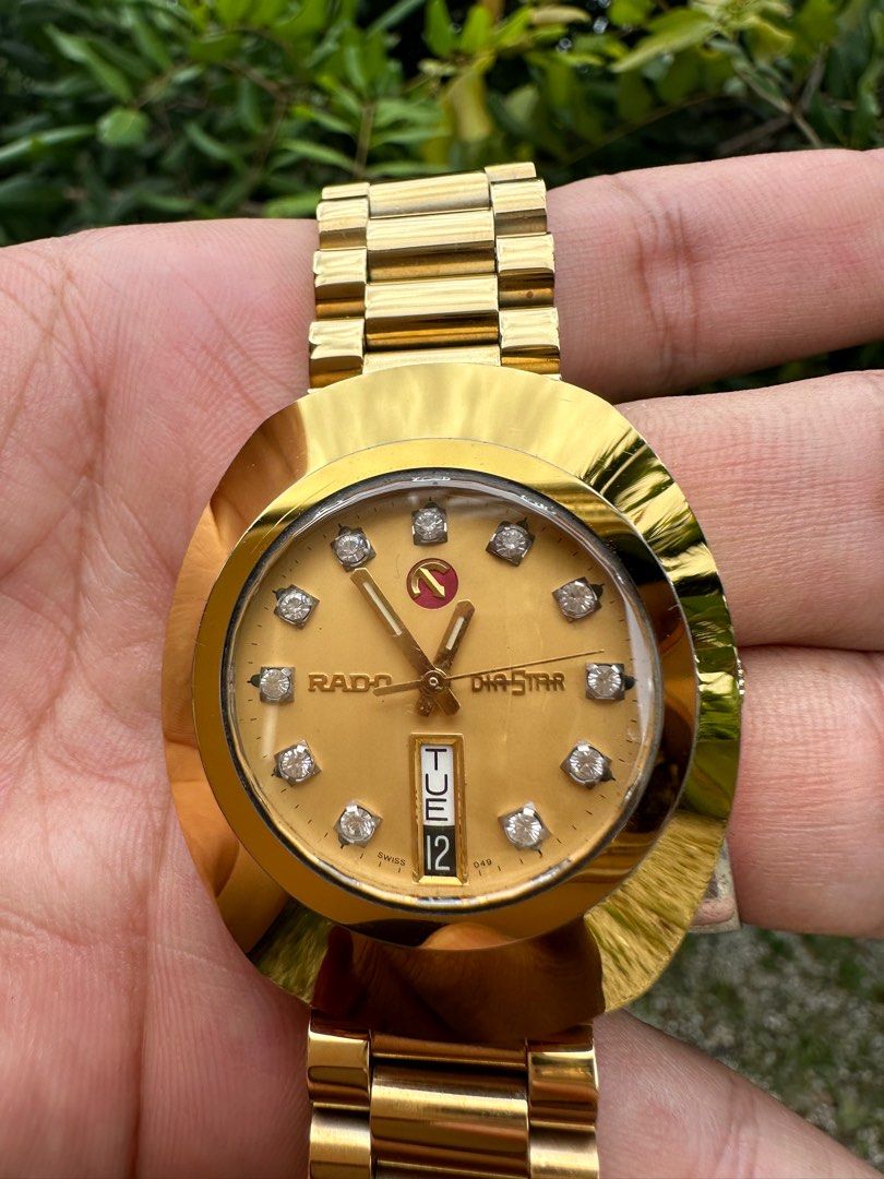 Jam rado emas sale