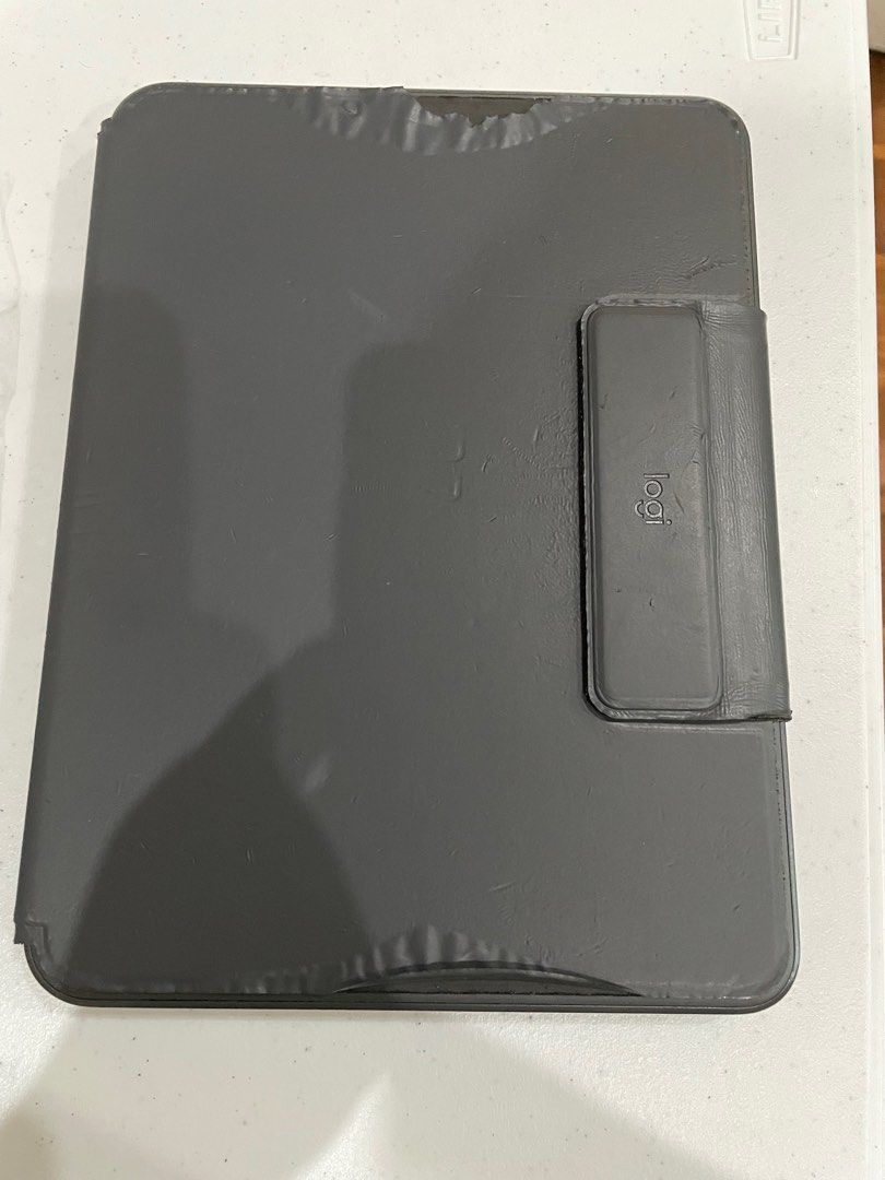 Logitech Slim Folio Pro for Ipad Pro Keyboard 11” (Category: Computer Keyboard) located in Pasig City. Submitted by chie_store (Listing ID 1256110341, Image 2). Description: Front is worn out, but all are working Keys, backlight and everything are working, no issues with operation.
