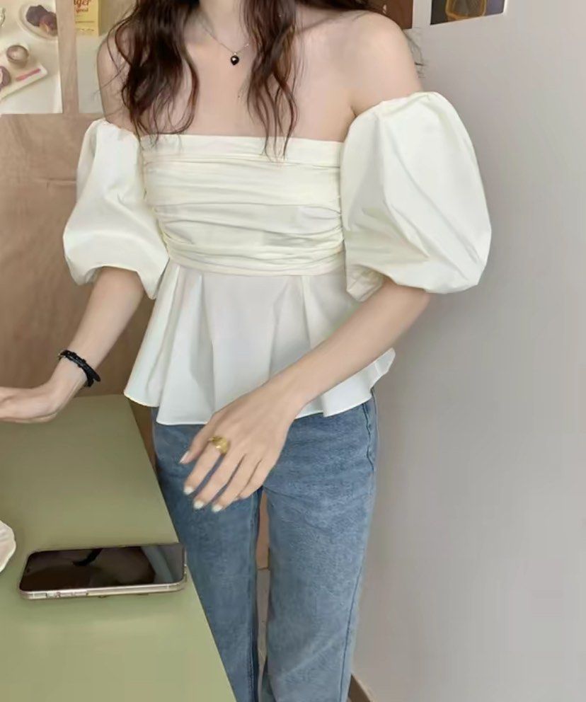 Off shoulder cream puff sleeve peplum top (Category: Blouses) located in Mandaluyong City. Submitted by sartorialdeclutter (Listing ID 1256053150, Image 1). Description: Size small Rfs: Accidentally bought 2 pieces.
