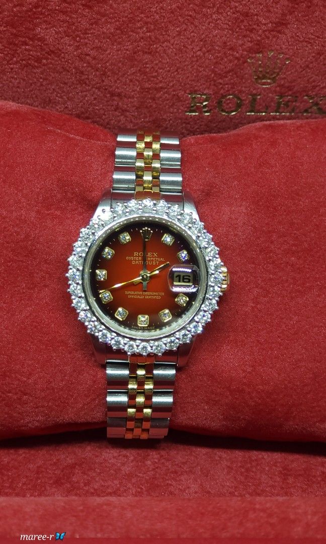 Red rolex hotsell with diamonds