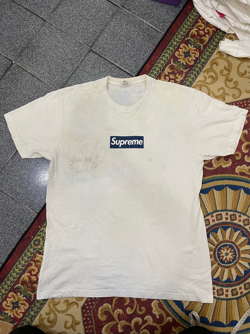 Step 1: Real vs fake Supreme Yankees bogo neck tag